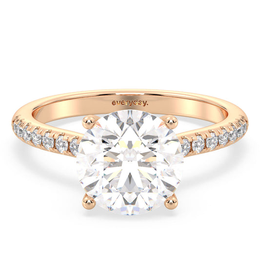 SOPHIA ROUND CUT SOLITAIRE RING WITH SIDE STONES IN A FANCY SETTING, GOLD