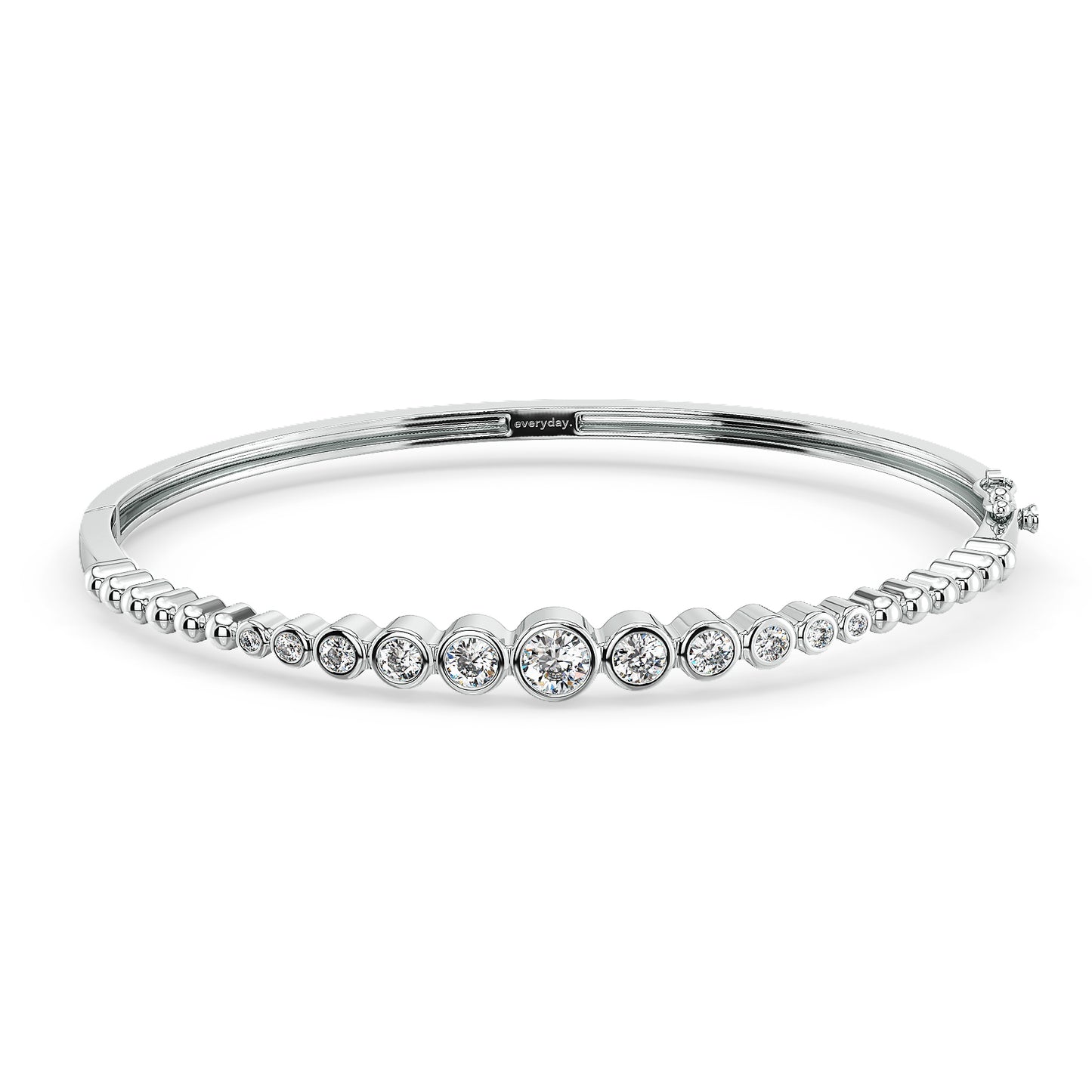 CLARETTE BEZEL SET ROUND CUT DIAMONDS OVAL BANGLE, GOLD