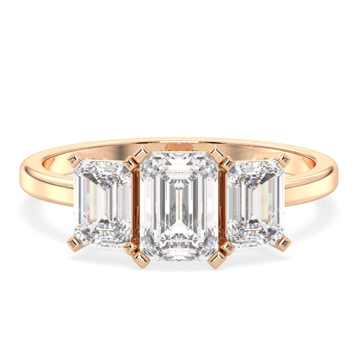 KATE THREE STONE EMERALD CUT RING, GOLD