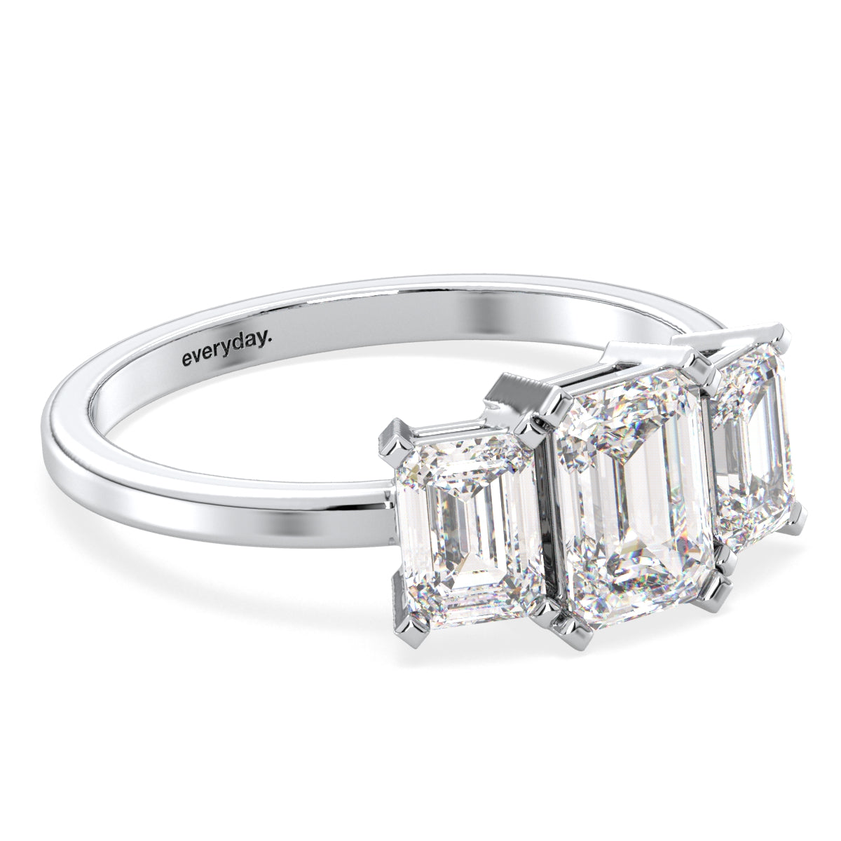 KATE THREE STONE EMERALD CUT RING, GOLD