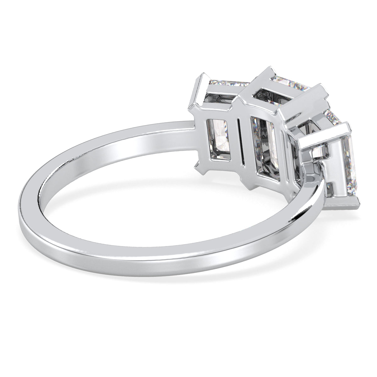 KATE THREE STONE EMERALD CUT RING, GOLD