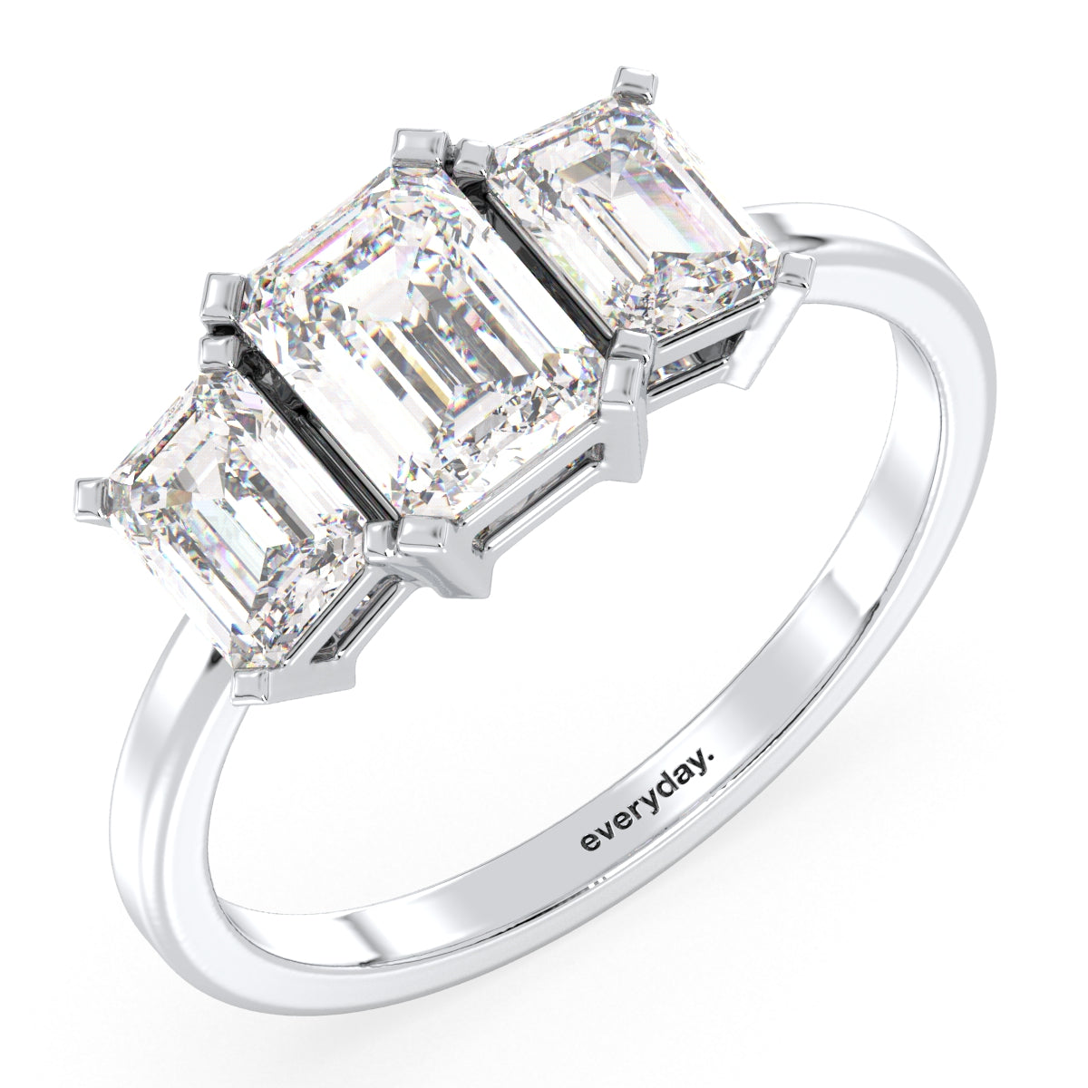 KATE THREE STONE EMERALD CUT RING, GOLD